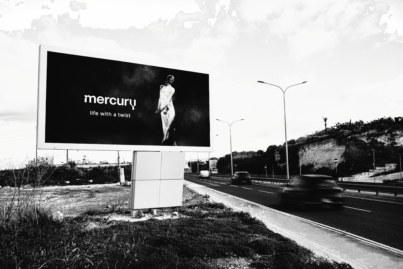 FACES roadside billboard with Mercury campaign, coast road and passing traffic
